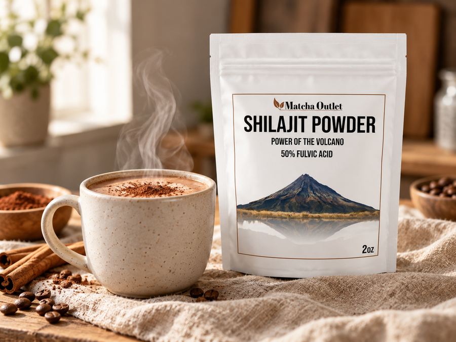 Matcha Outlet Shilajit Powder pouch beside a steaming mocha coffee on warm linen