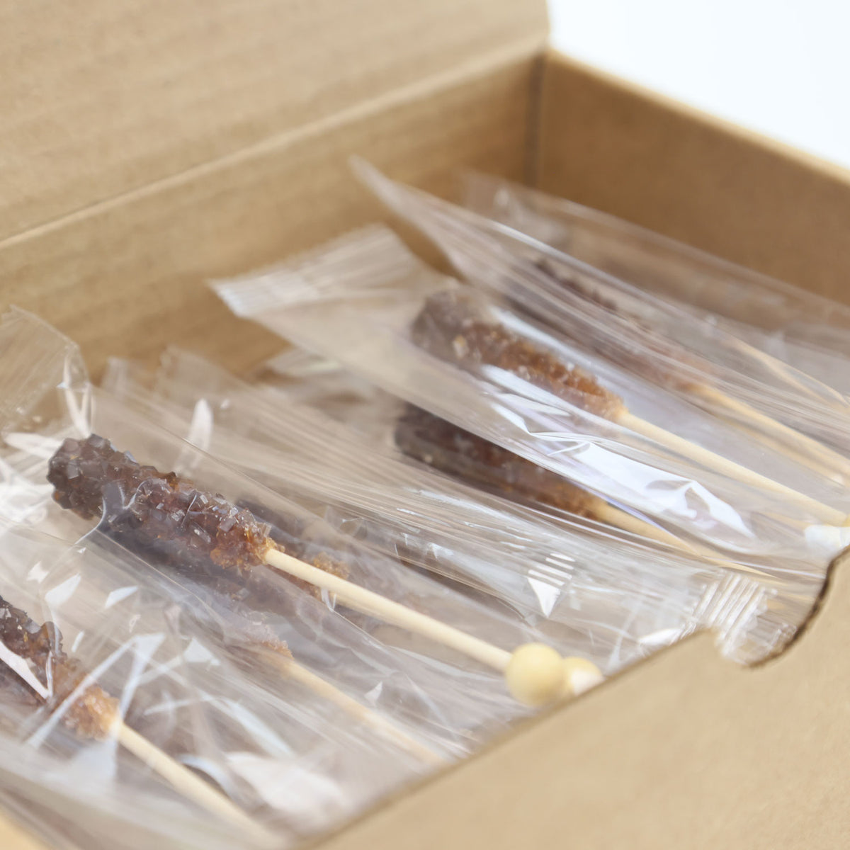 Box of individually wrapped 6 g sugar sticks